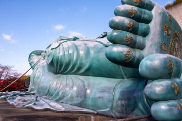 A huge reclining Buddha in Nanzo-in Temple near Fukuoka, Kyushu, Japan