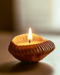 Cozy seashell candle glowing softly in warm light