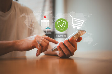 man holding smart phone paying online using digital wallet credit card, man using smartphone mobile to make a payment online sitting in home office