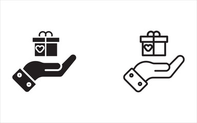 A hand holding a small gift box decorated with ribbons and heart symbols, symbolizing giving, generosity, donations, the concept of surprise, special gifts, and philanthropic gestures.