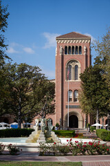 Fototapeta premium University tower and fountain in sunny courtyard