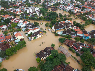 The deepest flood in history in Hoi An, Da Nang 2025. Aerial view of flooded ancient Asian town...