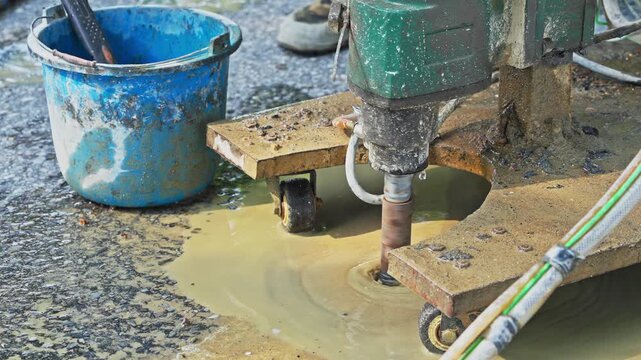 Workers using machinery to maintain the highway