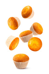 Falling muffins isolated on white background