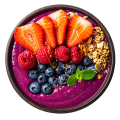Vibrant purple superfood smoothie bowl with berries, granola, and mint