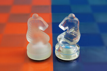 Horses facing each other mark a boundary on a chessboard, symbolizing strategy, leadership, and clear thinking in business or decision-making