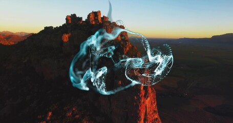 Bathing red rock cliff in golden light over desert valley and ridges, swirling blue digital waves