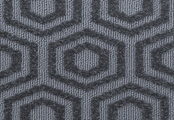 background texture of the carpet with hexagonal paving motif