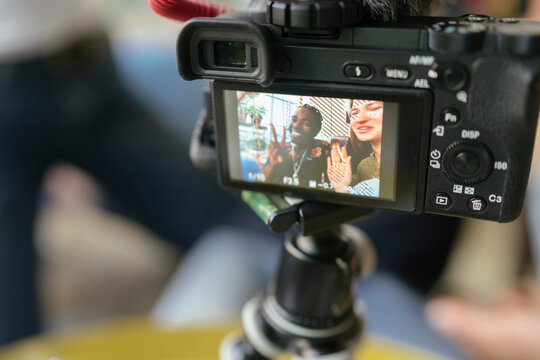 Three Friends Filming a Makeup tutorial