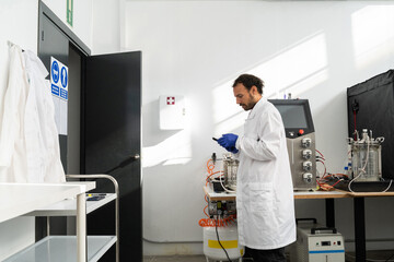  scientist researcher working on biotech laboratory