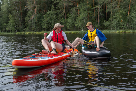 Family Paddleboarding Adventure with a Corgi