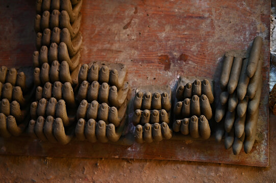 Clay fingers for Durga