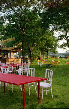 Empty tables and chairs in a park