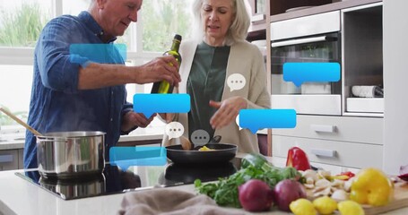 Senior man reaching and pouring olive oil into pan as woman stirring kitchen vegetables meal prep - Powered by Adobe