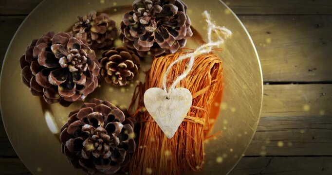 At start, camera zooming out and panning right revealing brass rim while golden particles floating