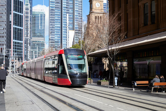 Tram Traveling Sydney City Street Near Historic Building