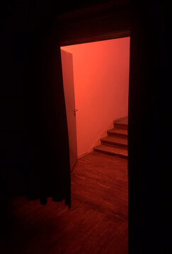 Stairs in red corridor 