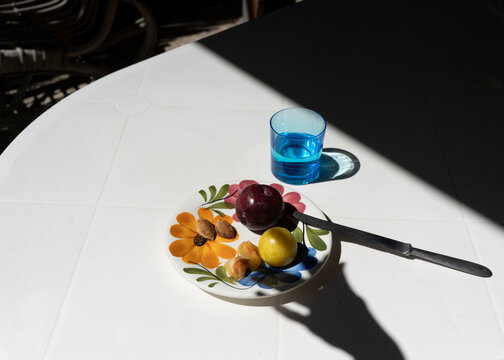 Blue glass, fruits and shandd shadow