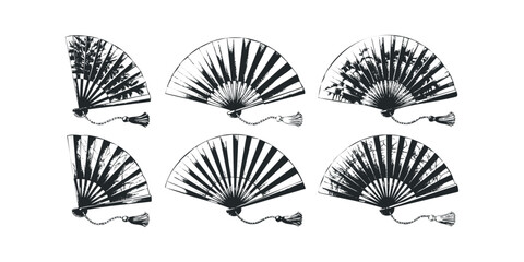 Collection of six black and white oriental fans with tassels