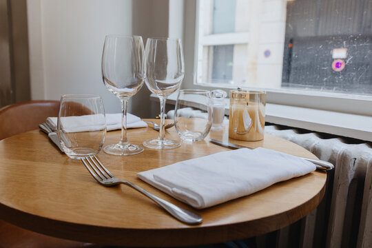 Elegant restaurant table setting by the window