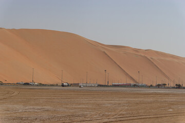 The massive, steep sand slope of Moreeb Dune