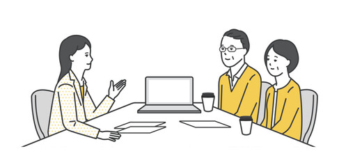 窓口でお客様の接客をするビジネスパーソン