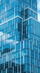 Skyward Reflections: A modern building's facade with its geometric interplay of glass and steel