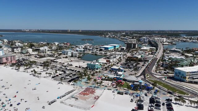 Downtown Fort Myers Beach and remnants of the historic Fort Myers Beach pier destroyed by Hurricane Ian on Estero Island, Fort Myers, Florida