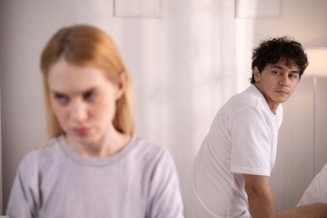 Couples who are angry at each other, fighting in bed, feeling frustrated, sad, divorce or relationship problems, marital stress, quarrels and arguments, unhappy spouses, and sexual dysfunction.