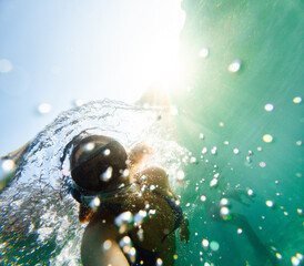 woman taking selfie while snorkeling underwater