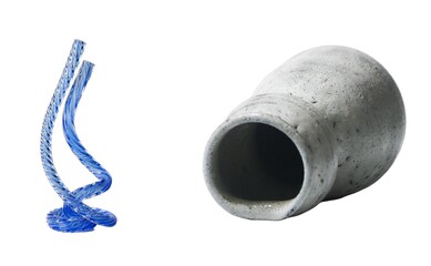 Artistic glass and clay pot showcase in a contemporary gallery with unique perspectives