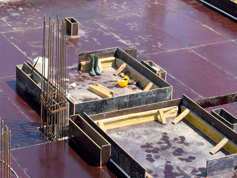 Construction Material and Equipment on Formwork Floor at Building Site