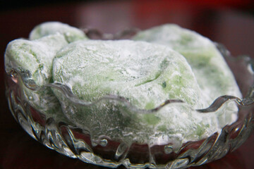 Wagashi: Close-Up of Fluffy Traditional Japanese Mochi (Daifuku) Dusted with Sweet Rice Flour