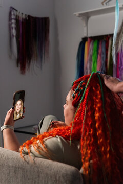 Woman talking to friend via video call