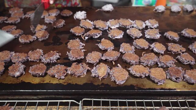 Making Khanom Babin: Thai Coconut Pancake Fritters Grilling on Hot Flat Griddle at Street Food Market 4K