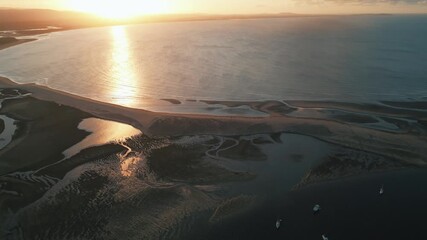 rone Footage of Tropical Queensland’s Town of 1770 at Sunset — Golden Coastal Light, Coral Sea Views, and Gateway to the Great Barrier Reef’s Pristine Marine Landscape