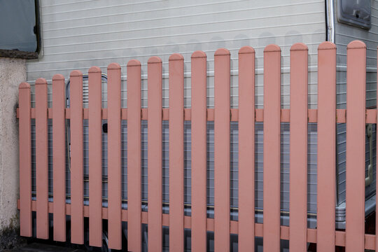 Caravan behind a fence