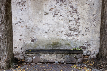 Old stone bench in the alleys