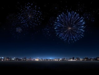 Vibrant blue fireworks explode over a modern city skyline at night illuminating the dark sky