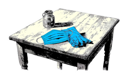 A wooden table with gloves and a mask, symbolizing health and safety measures.