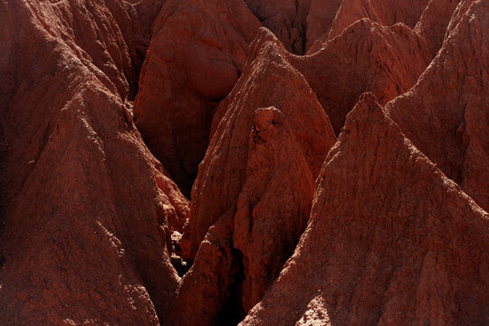 Close-up of eroded red desert rock formations
