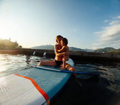 Mother and Child together on sup