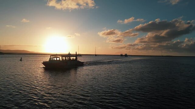 rone Footage of Tropical Queensland&rsquo;s Town of 1770 at Sunset &mdash; Golden Coastal Light, Coral Sea Views, and Gateway to the Great Barrier Reef&rsquo;s Pristine Marine Landscape