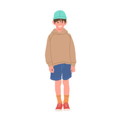 Smiling boy wearing brown hoodie, blue shorts, orange socks, red sneakers, and green cap. Cute child character illustration, isolated on white background, flat vector art style.