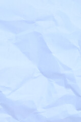 A series of crumpled paper textures, providing a rich, abstract background with intricate creases, shadows, and highlights, perfect for modern graphic design projects.