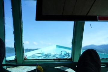 View inside the cabin of a wooden ship under sailing
