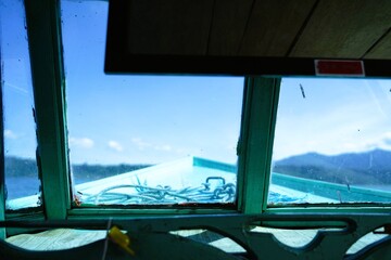 View inside the cabin of a wooden ship under sailing