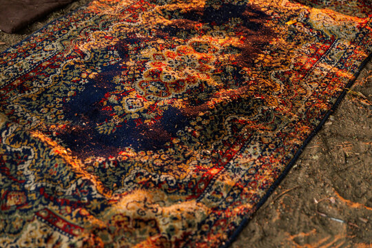 Colorful Vintage Rug On Sand In Camping Outdoors