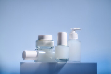 Minimalist skincare presentation with bottles and jars