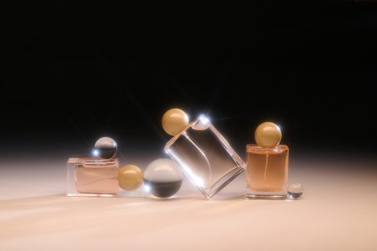 Elegant perfume bottles are displayed with glass spheres
